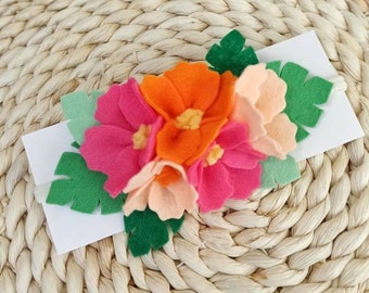 Tropical flower crown with hibiscus and monstera leaves