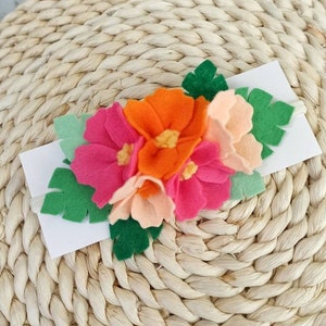 Tropical flower crown with hibiscus and monstera leaves