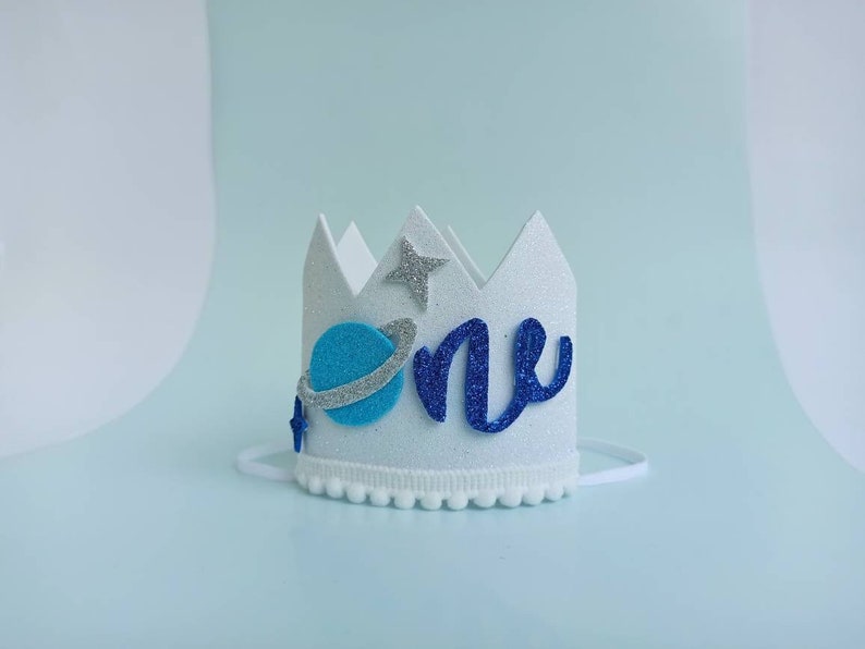 white birthday crown with blue planet for 1st baby birthday party