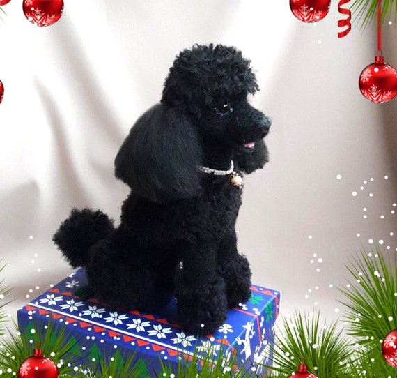 black toy poodle stuffed animal