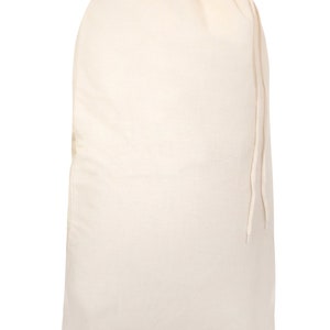 May include: A plain white drawstring bag made of cotton fabric.
