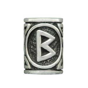 May include: A silver-colored cylindrical bead with a rune symbol. The bead features a textured surface and a circular design with the rune "B" in the center. The sides of the bead have an intricate pattern.