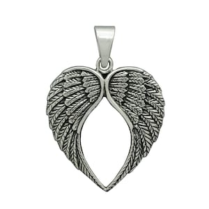 Colgante de corazón con alas de ángel en plata de ley: amuleto guardián gótico