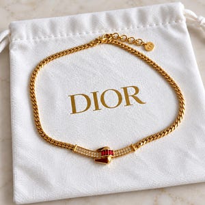 Vintage Christian Dior 14K Gold Plated Ruby & Crystal Buckle Collar Necklace.