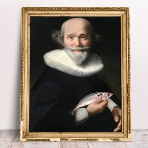 May include: A framed oil painting of a man with a white beard and ruff collar, holding a fish in his right hand.