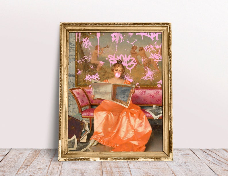 May include: A framed painting of a woman in a long orange dress sitting on a pink couch and reading a book. The painting is covered in pink spray paint graffiti.