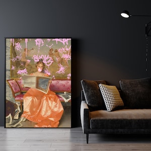 May include: A framed painting of a woman in a long orange dress sitting on a pink couch and reading a book. The painting is covered in pink graffiti.