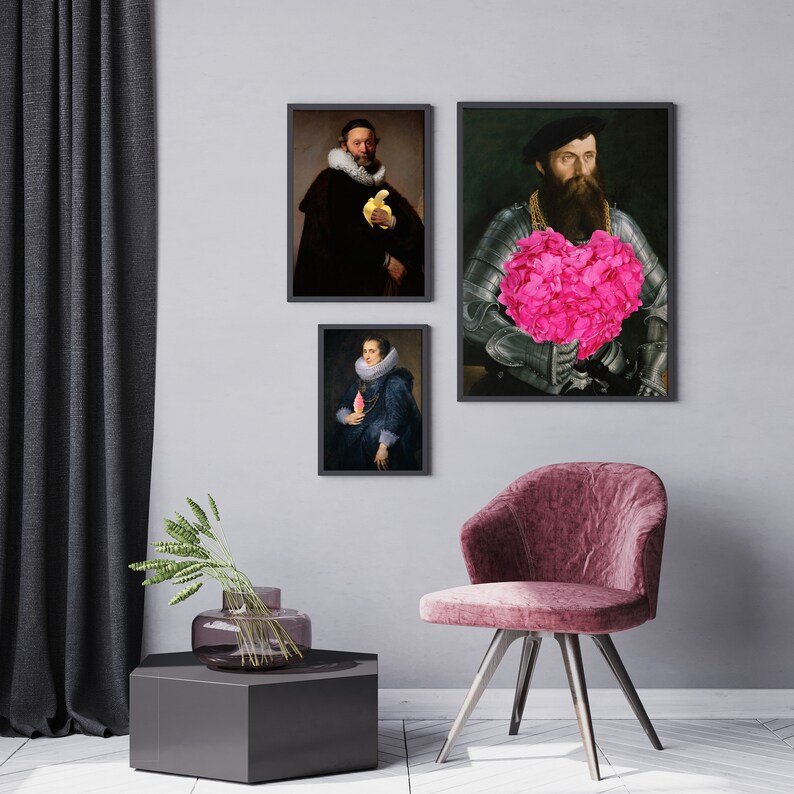 May include: Three framed portraits of people in historical clothing. The portraits are hung on a gray wall. The portrait on the left shows a man with a beard wearing a dark blue jacket and holding a yellow object. The portrait in the middle shows a woman with a white collar wearing a dark blue dress and holding a pink object. The portrait on the right shows a man with a beard wearing a dark blue jacket and holding a large pink flower.