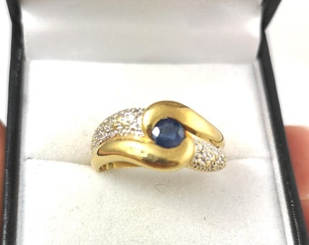 Vintage gekruiste 18K gouden saffierring