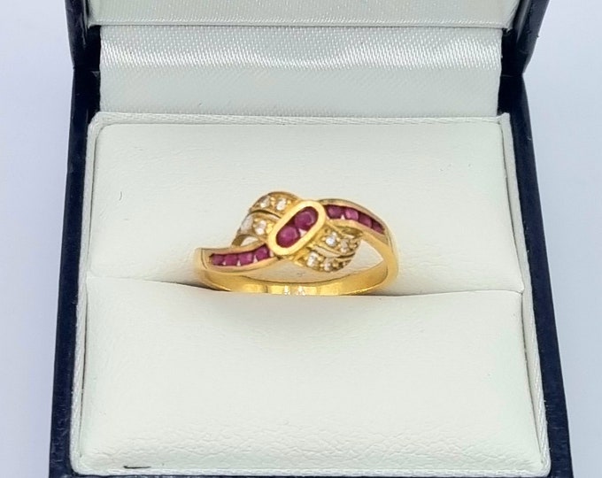 French vintage 18K gold ruby and diamond crossover ring