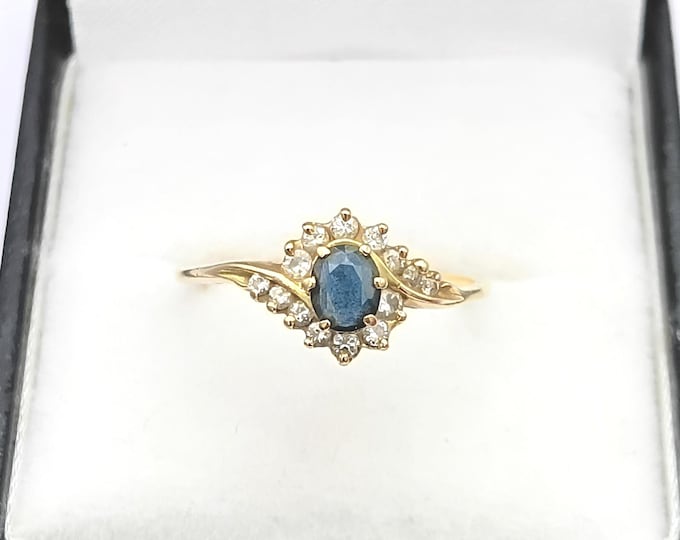Vintage 18K gold sapphire and diamond swirl ring