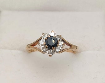 Vintage gouden ring met saffier en diamanten