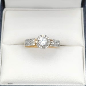 Antique diamond solitaire 18K gold ring