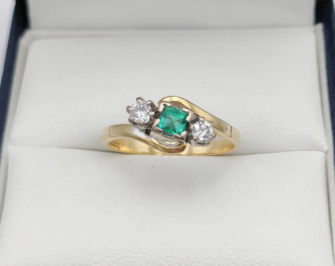 Vintage three stone 18K gold emerald and diamond ring