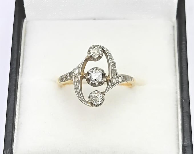 Antique platinum and 18K gold diamond trio ring