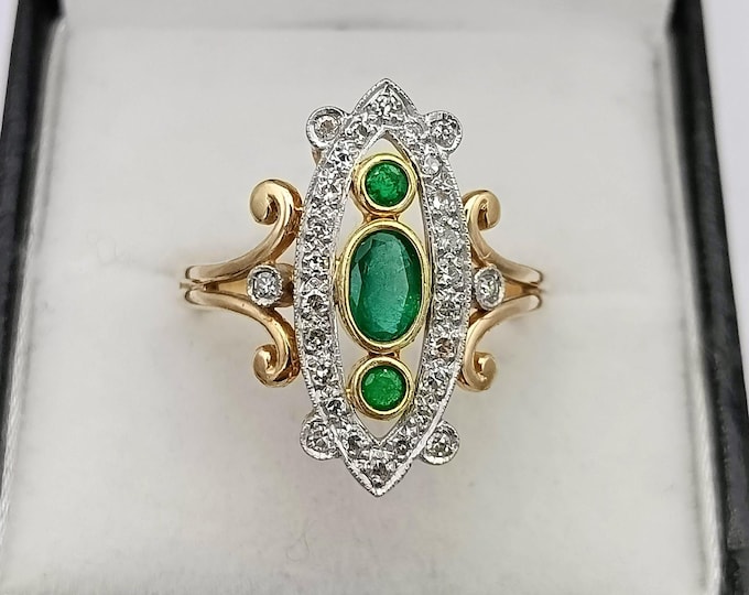 Vintage 18K gold emerald and diamond marquise ring