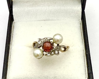 Antieke 18K gouden ring met drie stenen met parel en granaat