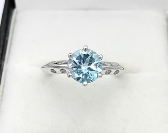 Vintage platina solitaire ring met aquamarijn en diamant