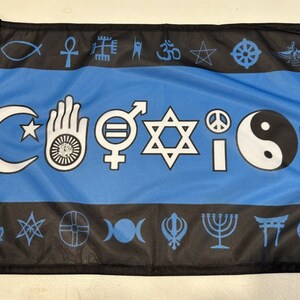 May include: A blue and black flag with the word "Coexist" printed in white. The flag features various religious and cultural symbols, including a crescent moon, a Star of David, a peace sign, a yin-yang symbol, and a cross.
