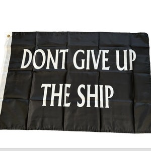 May include: A black flag with white text that reads "Don't Give Up The Ship".