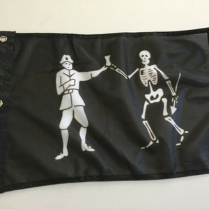 May include: A black pirate flag with a white skeleton holding a sword and a white figure in a hat holding a cup.