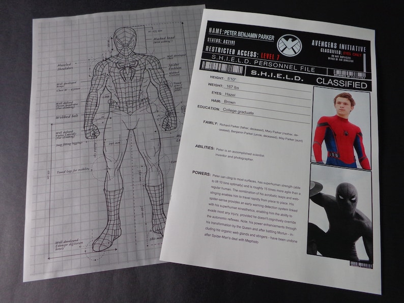 May include: A black and white line drawing of Spider-Man's anatomy on a gridded background. A S.H.I.E.L.D. personnel file for Peter Benjamin Parker, with a photo of Tom Holland as Spider-Man, lists his height as 5'10", eyes as hazel, hair as brown, and education as college graduate. The file also includes information about his family, abilities, and powers.