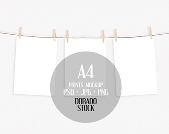 A4 print set mockup with clothespins. Three A4 prints mockup