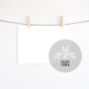 A4 landscape sheet mockup with clothespins