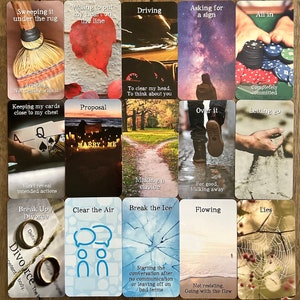 May include: A set of 16 cards with various images and text. The cards are arranged in a 4x4 grid. The text on the cards includes phrases like "Sweeping it under the rug", "Willing to put my heart on the line", "Driving", "Asking for a sign", "All in", "Avoiding", "Not dealing with it", "Proposal", "Over it", "Letting go", "Keeping my cards close to my chest", "Making a choice", "For good, Walking away", "Break Up / Divorce", "Clear the Air", "Break the Ice", "Flowing", "Lies", "To clear my head, To think about you", "Completely committed", "Won't reveal intended actions", "Starting the conversation after no communication or leaving off on bad terms", "Not resisting, Going with the flow".