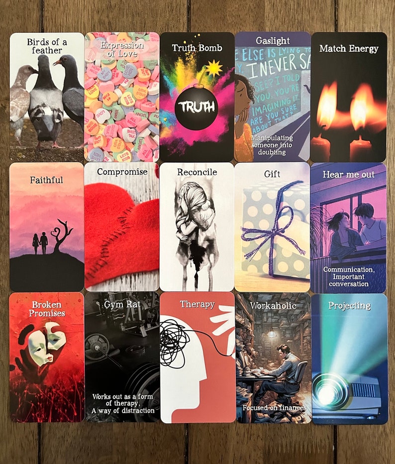 May include: A set of 16 tarot cards with colorful illustrations and text. The cards are arranged in a 4x4 grid on a wooden surface. The cards feature themes such as truth, gaslighting, compromise, and therapy.