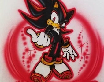 May include: A red and black cartoon character with a red background and the word "Ghost" in black letters. The character is a hedgehog with a red and black design.