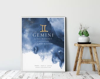 May include: A rectangular wall art print featuring a deep blue watercolor wash background with gold foil accents. The text reads Gemini, A Day Without Laughter Is A Day Wasted, Twins, May 21 - Jun 20, and Curious, Affectionate, Kind in white and gold.