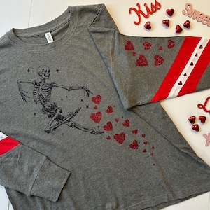 Dancing Skeleton Valentine&#39;s T-shirt: Glitter Hearts, Varsity Style