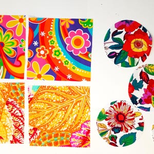 May include: Four square fabric patches and five circular fabric patches featuring vibrant patterns. Two squares display colorful psychedelic floral and rainbow designs, while two show orange and yellow leaf prints. The circles feature floral prints.