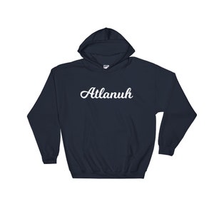 May include: A navy blue hooded sweatshirt with the word "Atlanuh" printed in white cursive on the front.