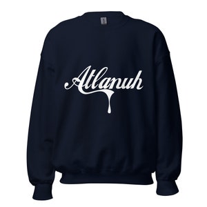 May include: A navy blue sweatshirt with a white graphic of the word "Atlanuh" in a dripping font.