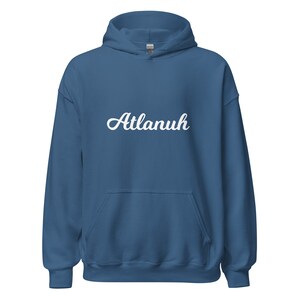 May include: A blue hooded sweatshirt with the word "Atlanuh" printed in white cursive on the front.