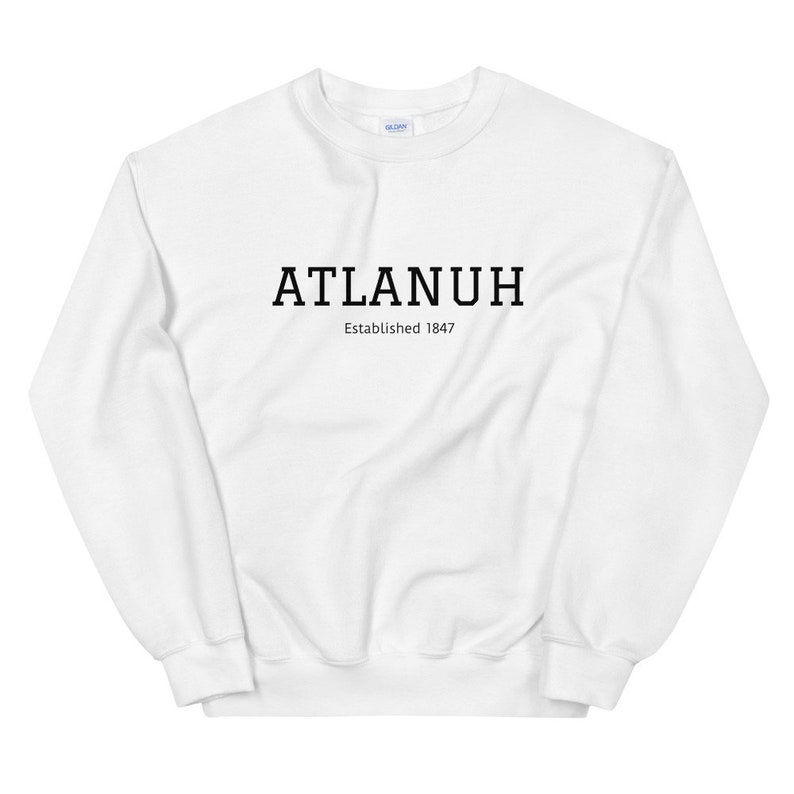 May include: White sweatshirt with black text that reads "ATLANUH Established 1847".