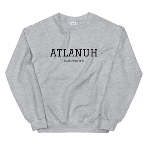 May include: A gray sweatshirt with black text that reads "ATLANUH Established 1847".