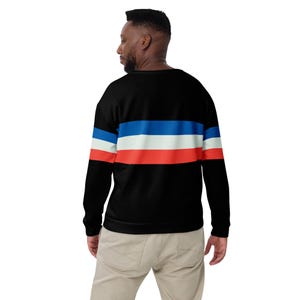 May include: Black sweatshirt with a horizontal stripe pattern in red, white, and blue. The stripes are thick and bold.