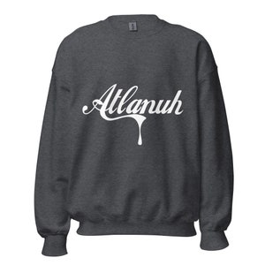 May include: A dark gray sweatshirt with a white graphic of the word "Atlanuh" in a dripping font.