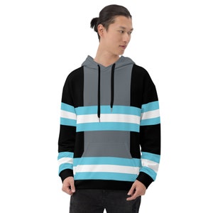 May include: A black and gray striped hoodie with a blue and white stripe pattern. The hoodie has a drawstring hood and a kangaroo pocket.