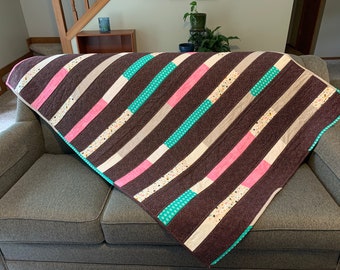 Unique modern throw quilt, eye-catching design