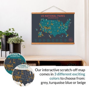 May include: A scratch-off map of the United States featuring all the National Parks. The map is in a dark blue colour with gold icons representing each park. The map is framed with a wooden frame and hanging on a white wall. The text "US National Parks Explorers Guide" is printed at the top of the map.