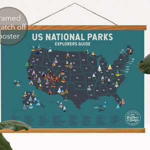 May include: A framed scratch-off poster of the United States with a map of all the National Parks. The poster is teal blue with a dark gray map of the US. Each state has a small image of a National Park within its borders. The poster has the text "US National Parks Explorers Guide" at the top and "Protect Our Parks" at the bottom.