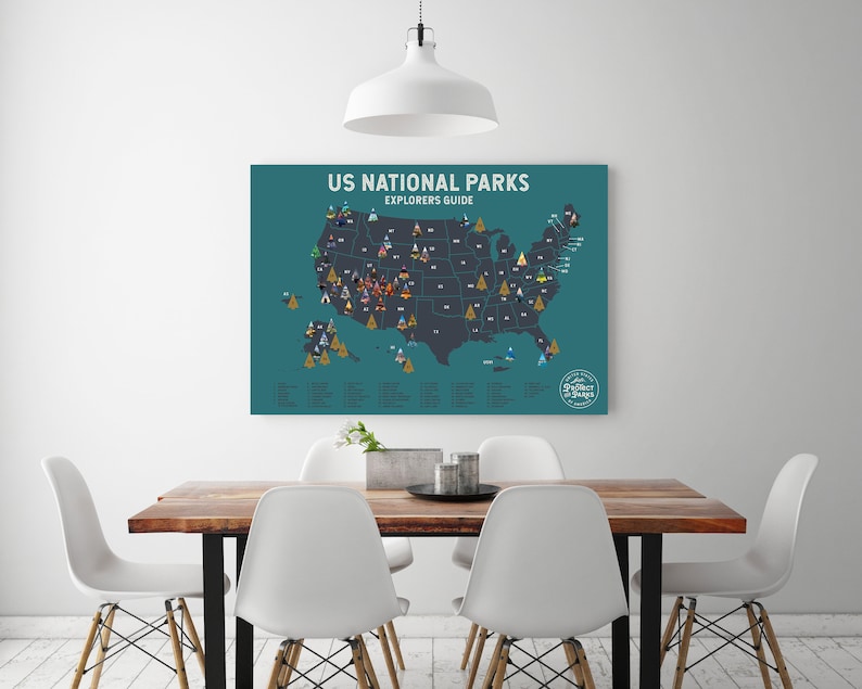May include: A teal blue poster with a map of the United States showing the locations of all the National Parks. The poster has the text "US National Parks Explorers Guide" at the top.
