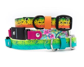 May include: Three stacked dog collars. The top collar is yellow and orange with black spots and a black buckle. The middle collar features a pink and green floral pattern with a black Fi tracker module. The bottom collar is teal and green.
