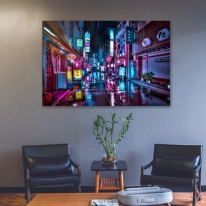 May include: A neon-lit street scene in Japan with colorful signs and wet pavement. The street is lined with buildings and shops, and the atmosphere is vibrant and energetic.