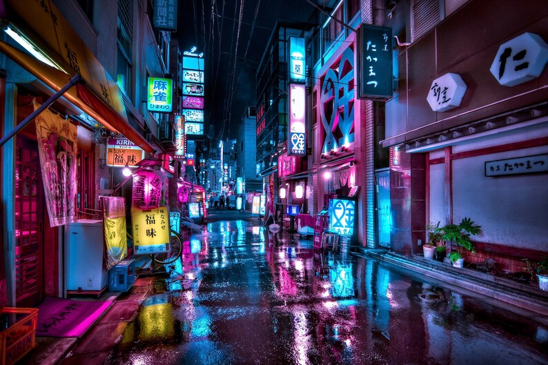 May include: A narrow, neon-lit street in Japan at night. The street is wet from rain, reflecting the colorful lights.  The buildings are lined with Japanese signs and lanterns.
