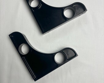 Two machined 1" wide black aluminum shelf brackets 5.75 x 6.25